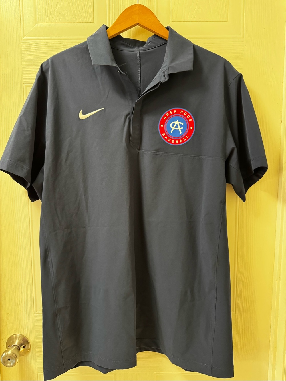 Nike Men's Dark Gray Polo with Red & Blue Area Code Baseball Patch